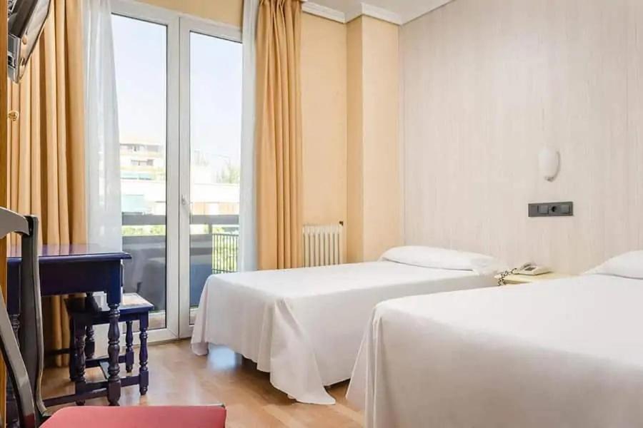 Camera Doppia con Letti Singoli
