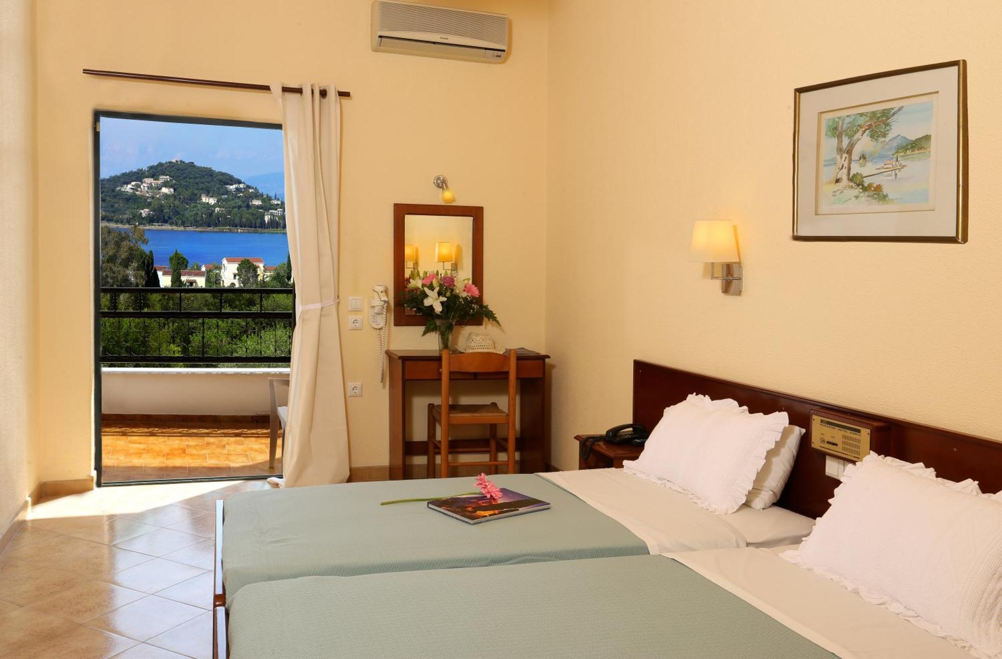 Standaard Tweepersoonskamer met 1 of 2 Bedden en Uitzicht op de Tuin