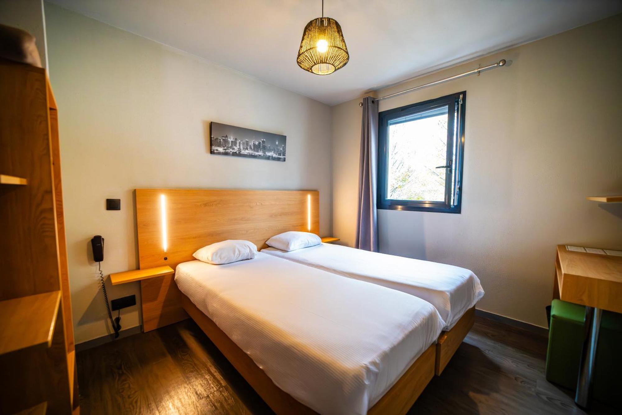 Tweepersoonskamer met 2 Aparte Bedden