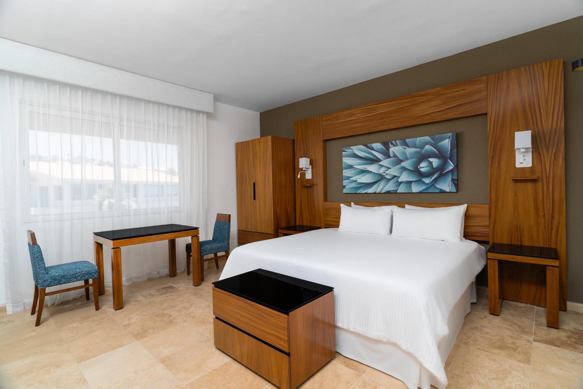 Deluxe Palmilla con cama extragrande y vistas al jardín