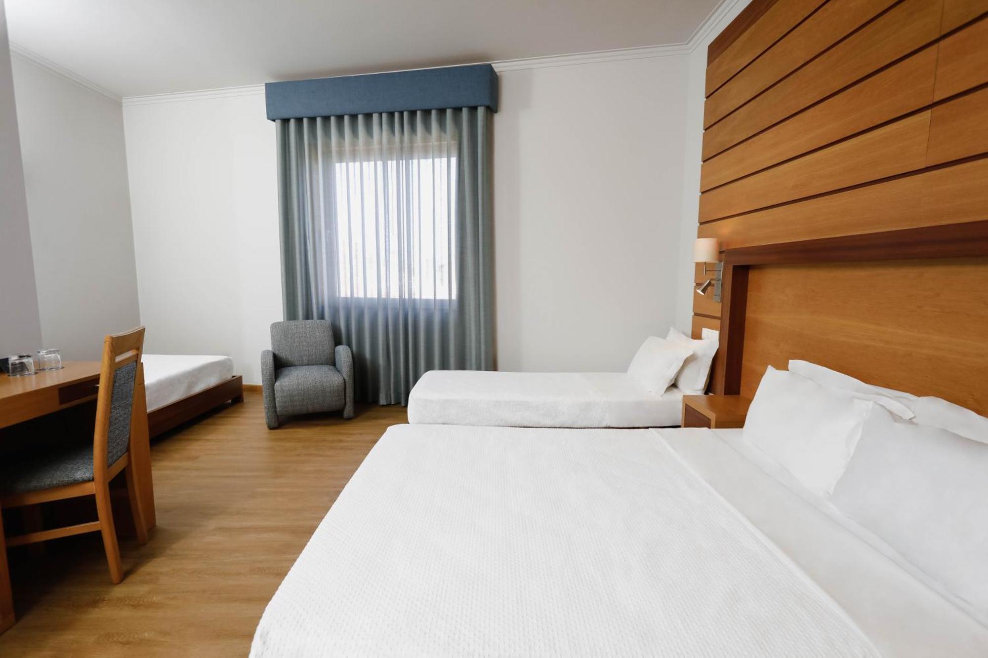 Quarto Duplo com Cama Extra