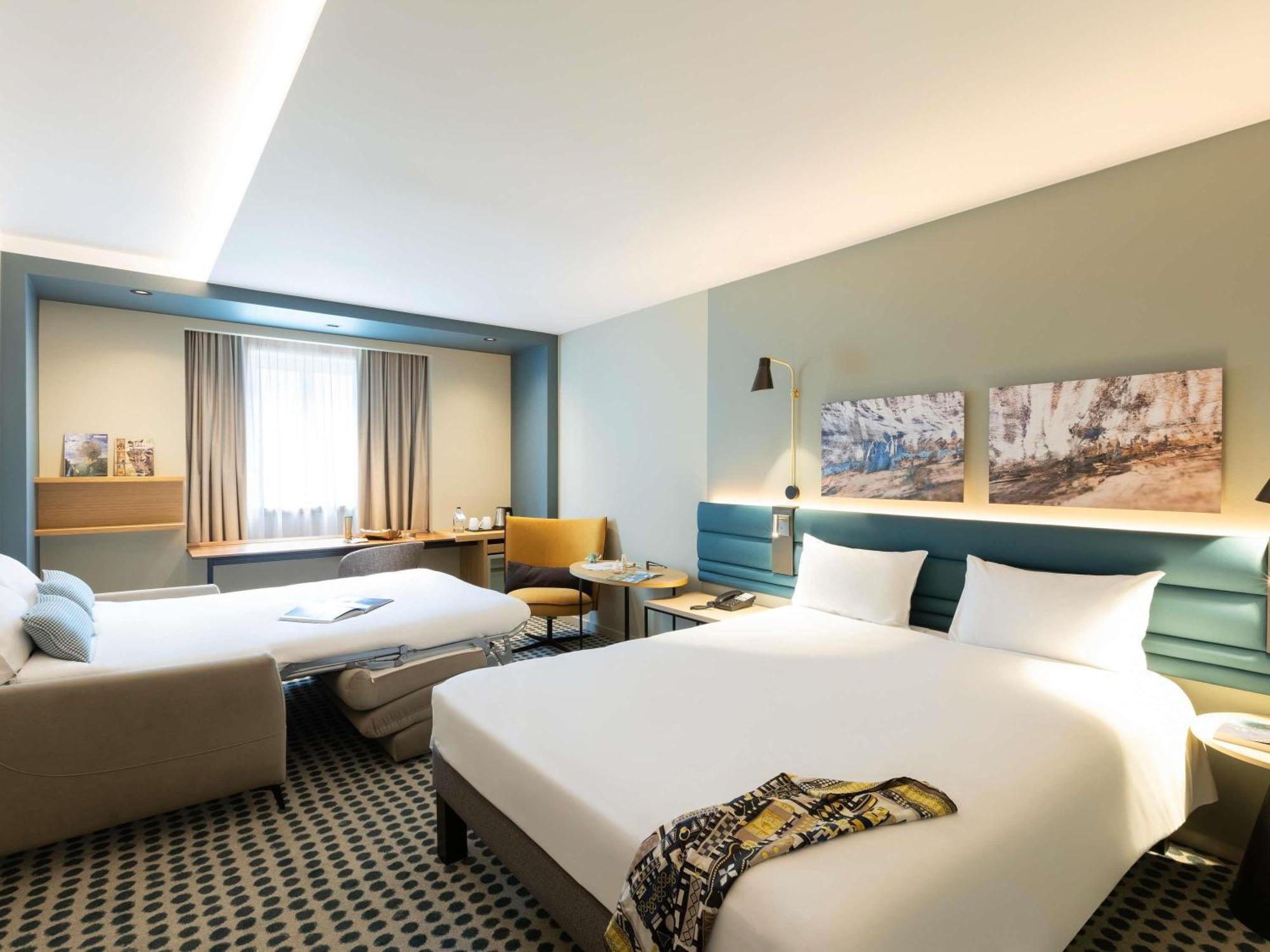 Superior Zimmer mit Queensize-Bett und Sofa