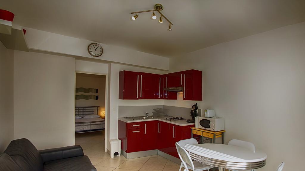 Suite 1 Chambre (4 Adultes) - Rez-de-Chaussée