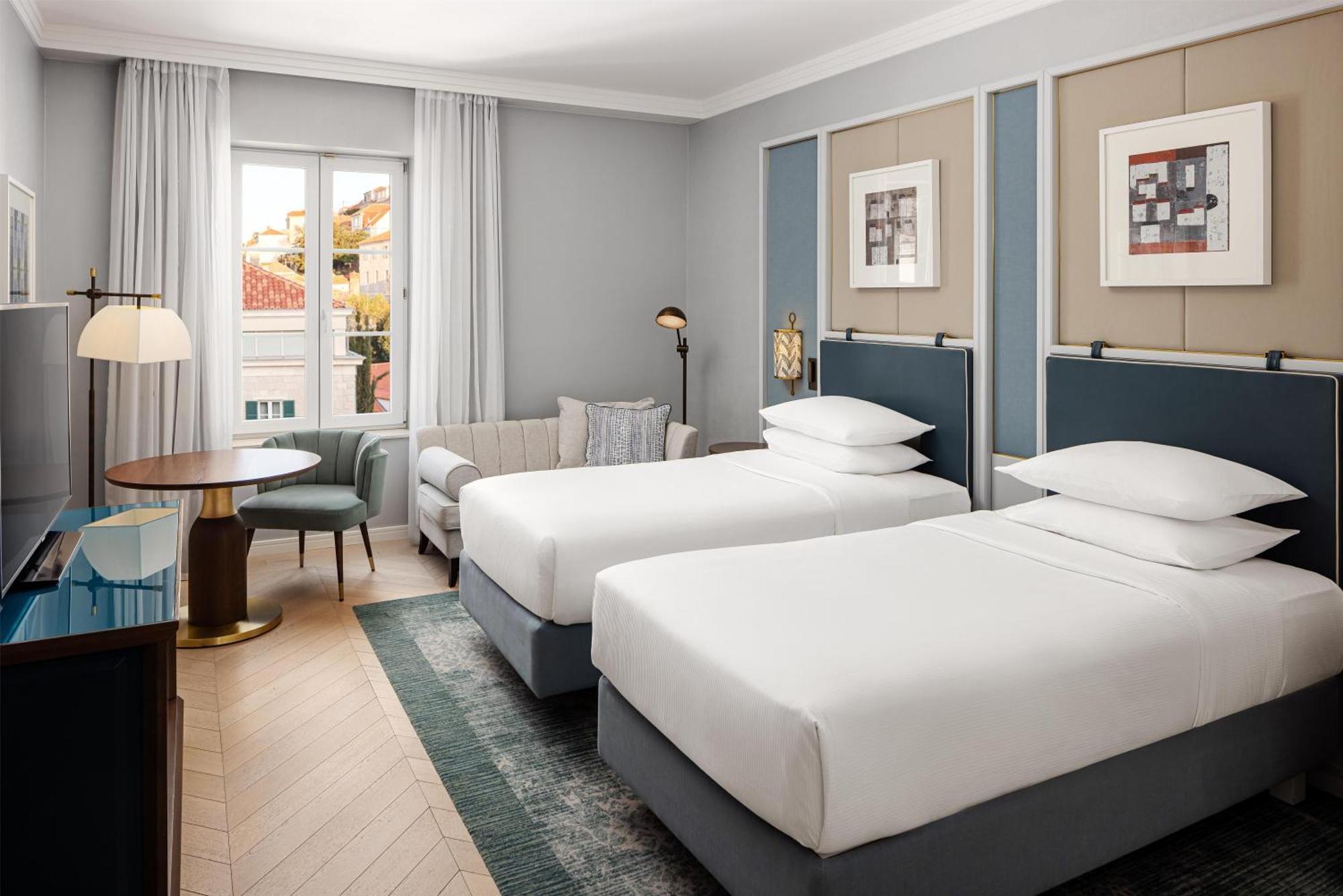 Quarto com 2 Camas de Solteiro