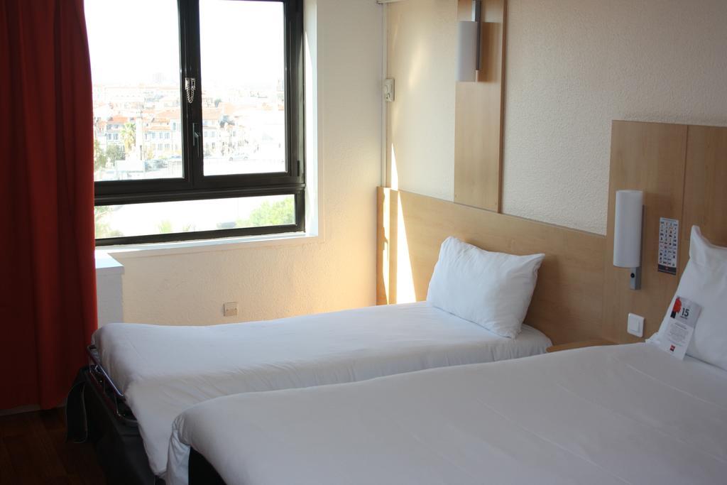 Habitación Triple Superior con sofá cama