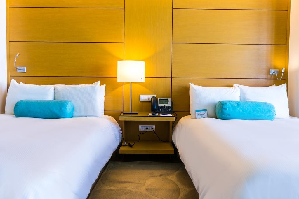 Quarto Superior com Cama de Casal e Vista de Acapulco Diamante