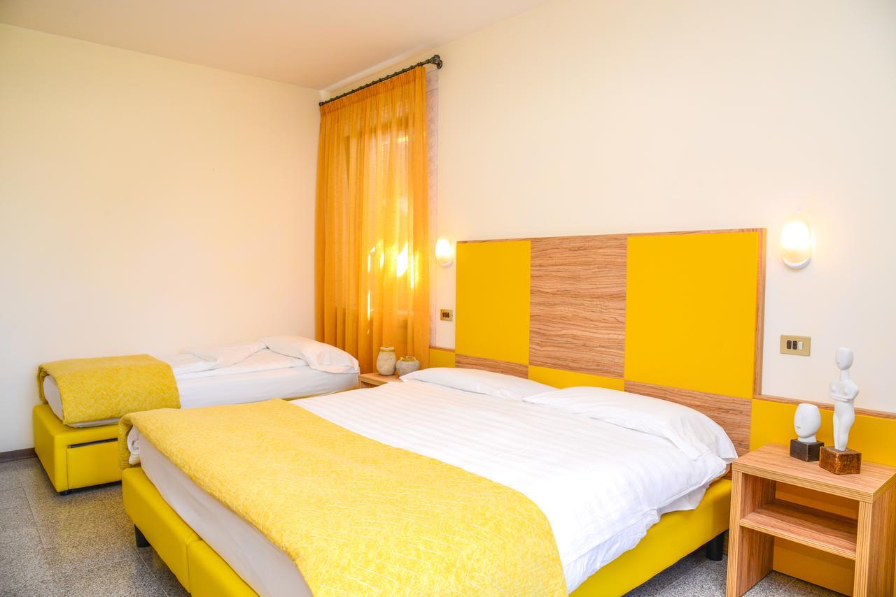Dreibettzimmer mit Balkon oder Terrasse