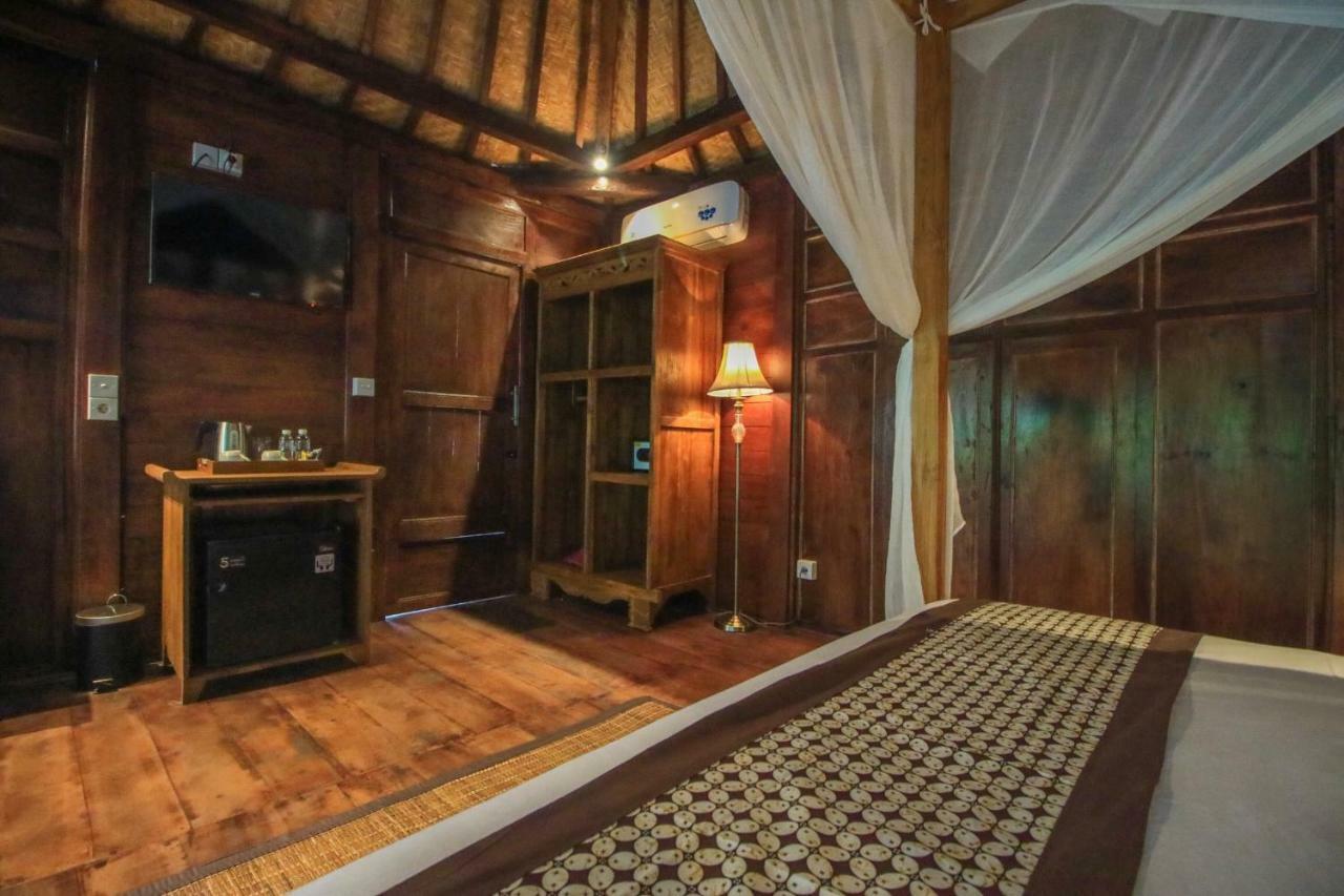Villa Joglo exclusiva con vistas a la piscina y té de la tarde diario