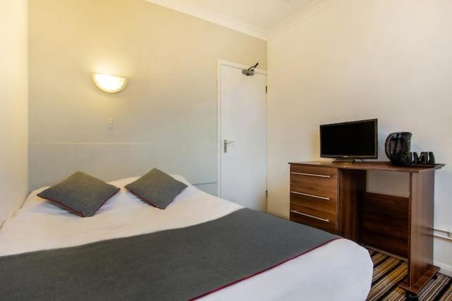 Tweepersoonskamer met Gedeelde Badkamer